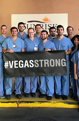 Hospital staff with Vegas Strong banner