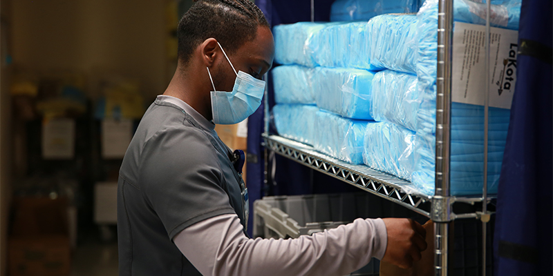 Mike Francoeur, PPE Steward at JFK Medical Center in Florida, prepares and distributes personal protective equipment for colleagues at the hospital