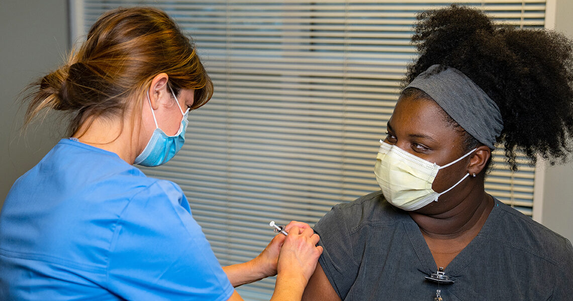 Colleagues urge vaccinations and share experiences