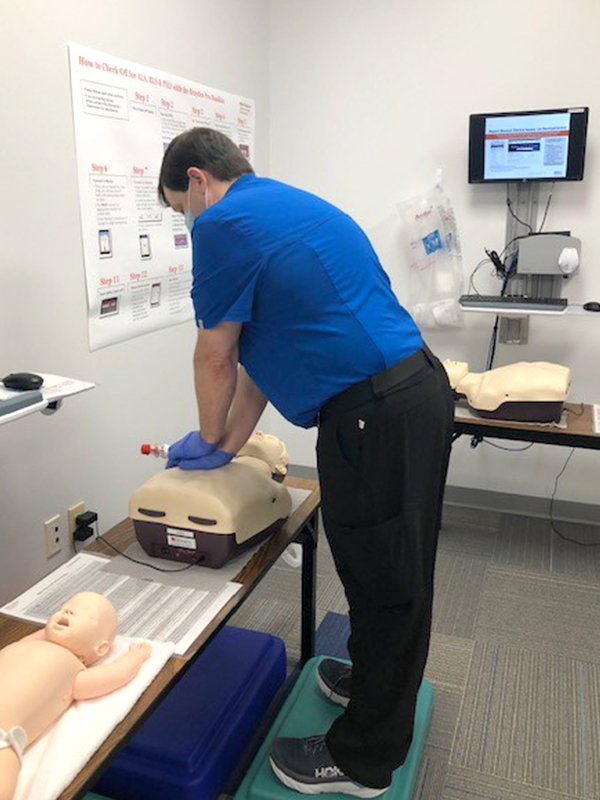 Michael Young practices CPR at the HCA Healthcare Center for Clinical Advancement at Doctors Hospital of Augusta in Augusta, Ga.