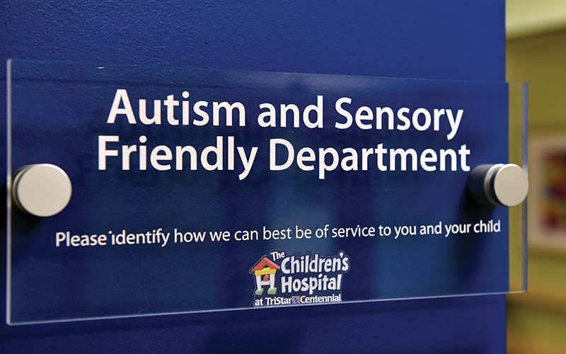 Photo of the Autism and Sensory Friendly Department placard on the wall.
