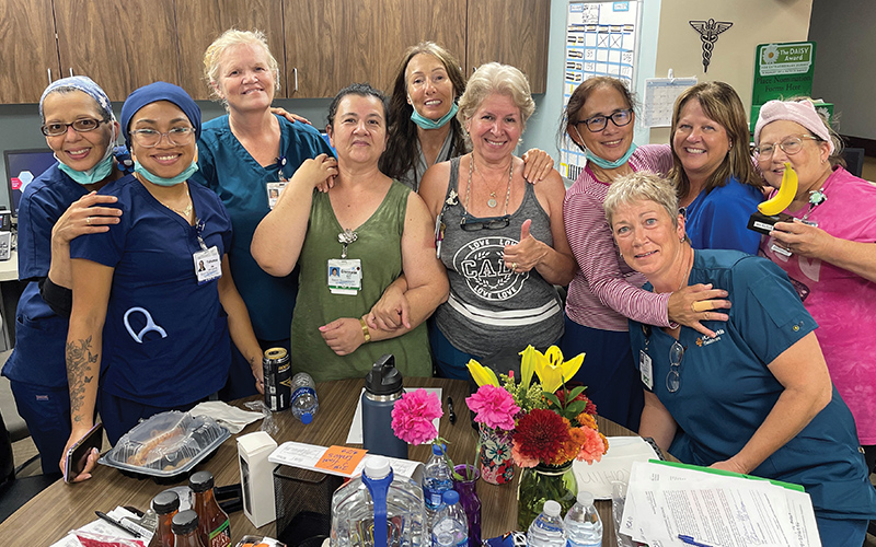HCA Florida Fawcett Hospital caregivers, lovingly pose together.