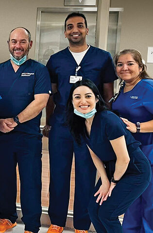 Photo of colleagues at Corpus Christi Medical Center Bay Area in Corpus Christi, Texas during a visit with market vice president of human resources, Doug Goodman.